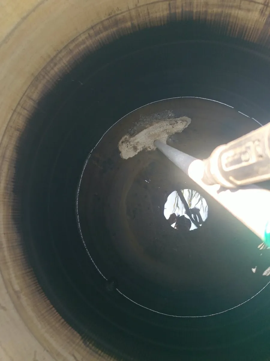 Mechanised water tank cleaning equipment in action